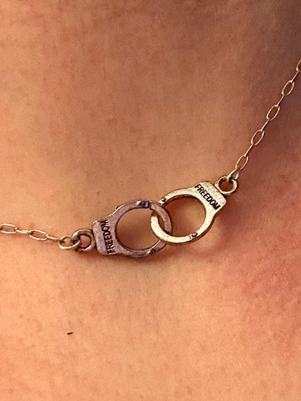 Handcuff pendant on sterling silver chain 16"